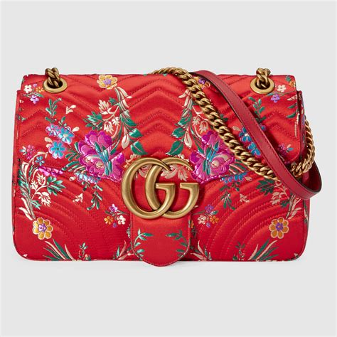 gucci handtas flowers|Gucci flower bomb.